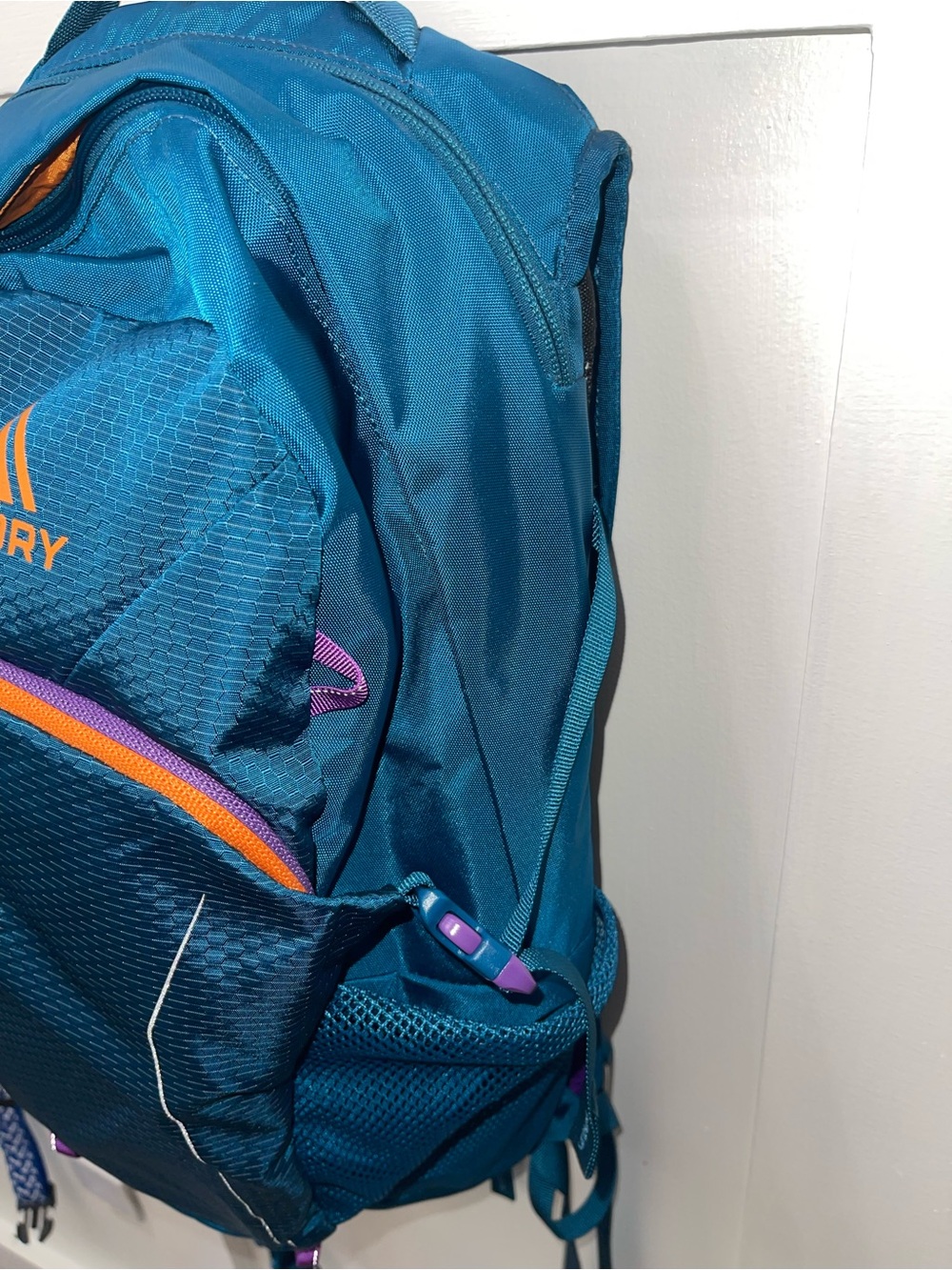 Gregory teal daypack with orange and purple accents - Picture 5 of 6